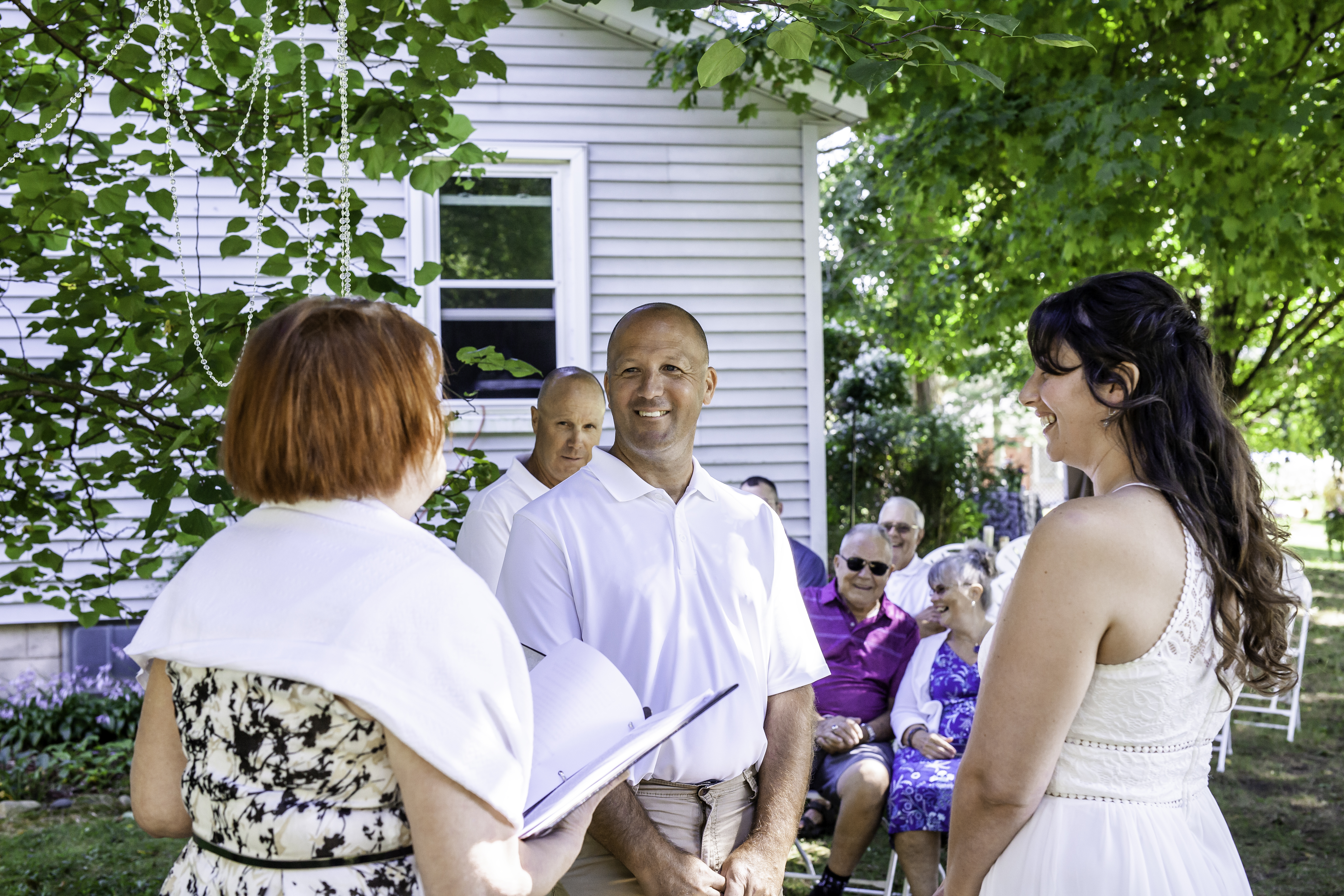 Smiling couple during wedding ceremony