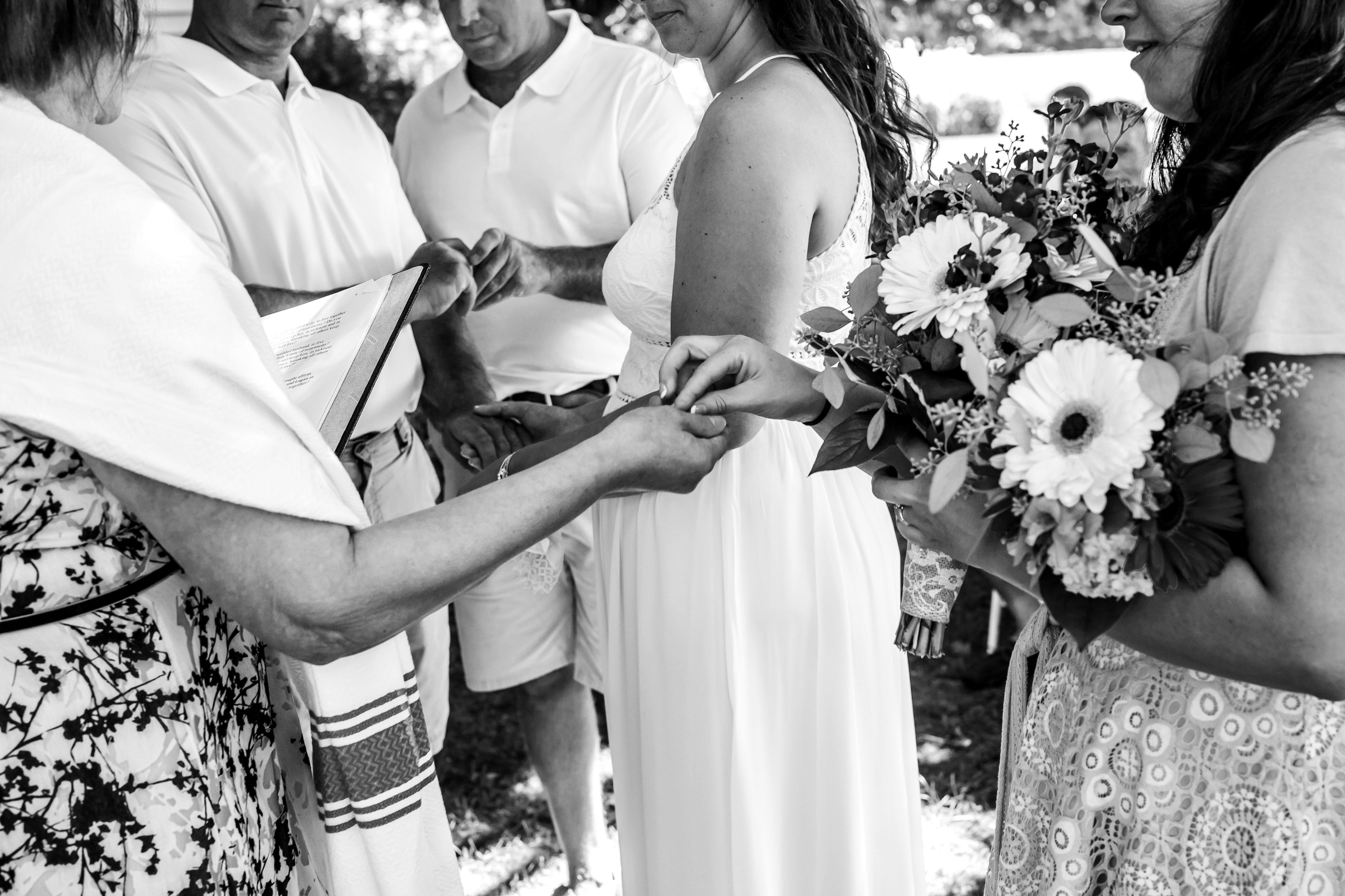 Women passing the ring from one to another