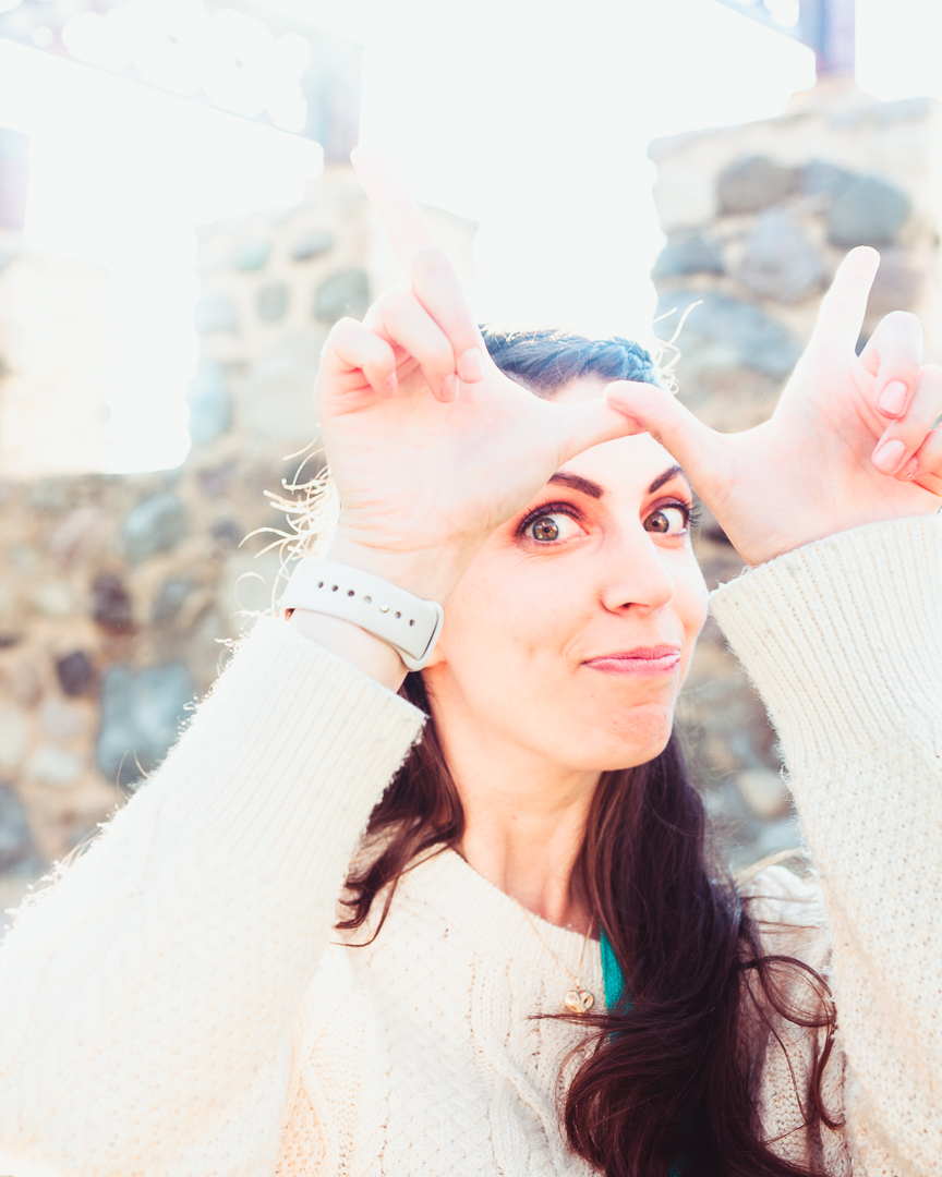 Music Teacher making the "whatever" sign on her forehead