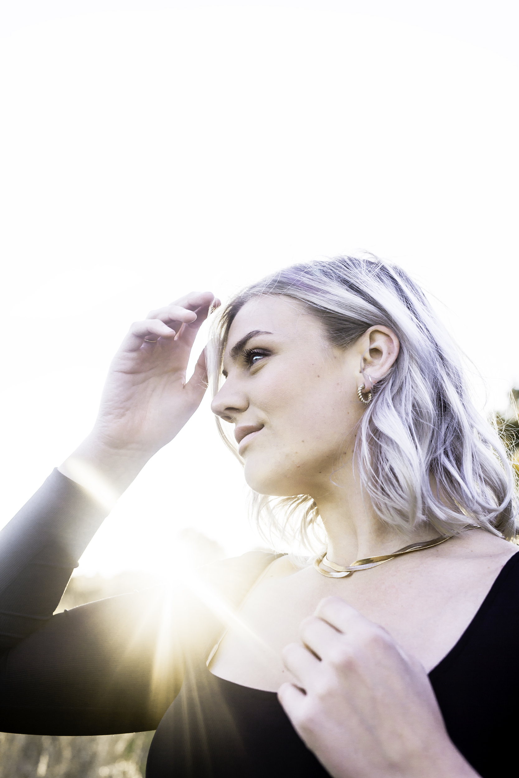 Side view of J backlit by the sunset