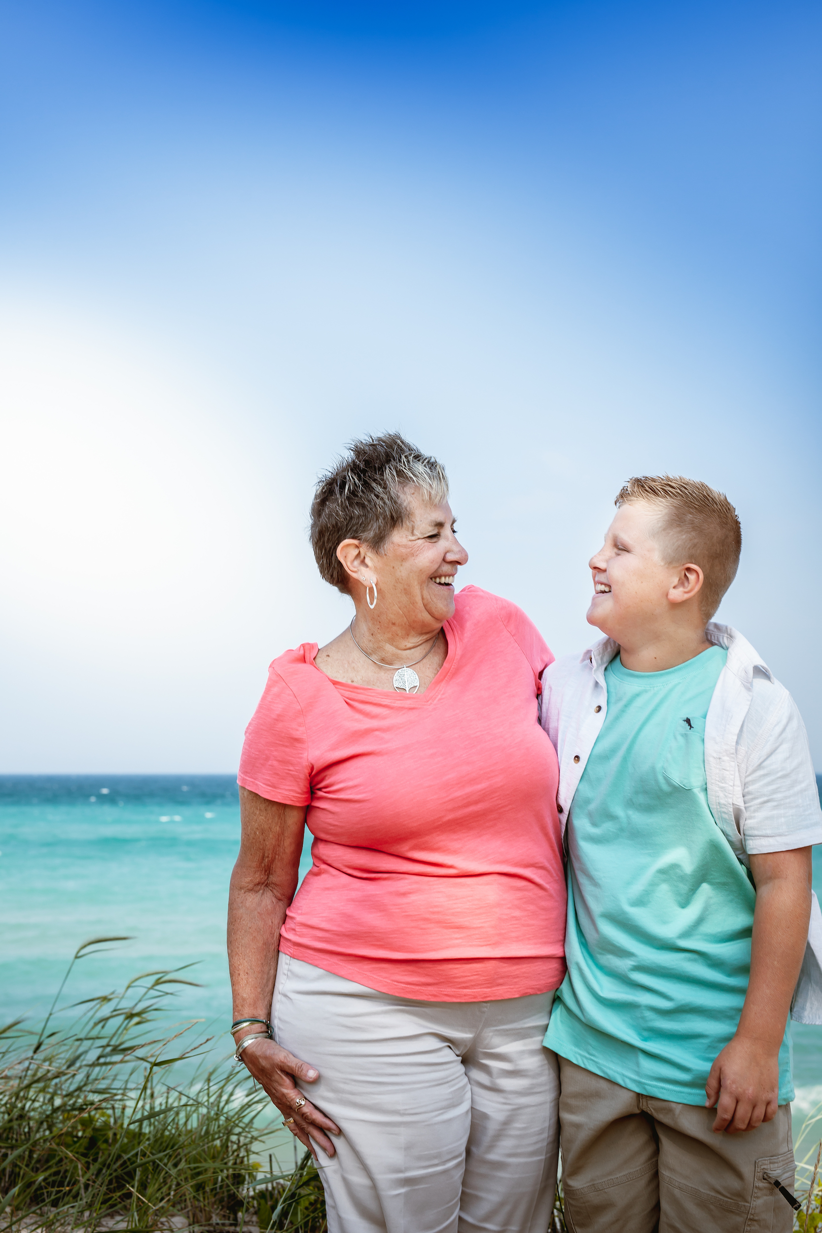 Woman and child smiling and each other