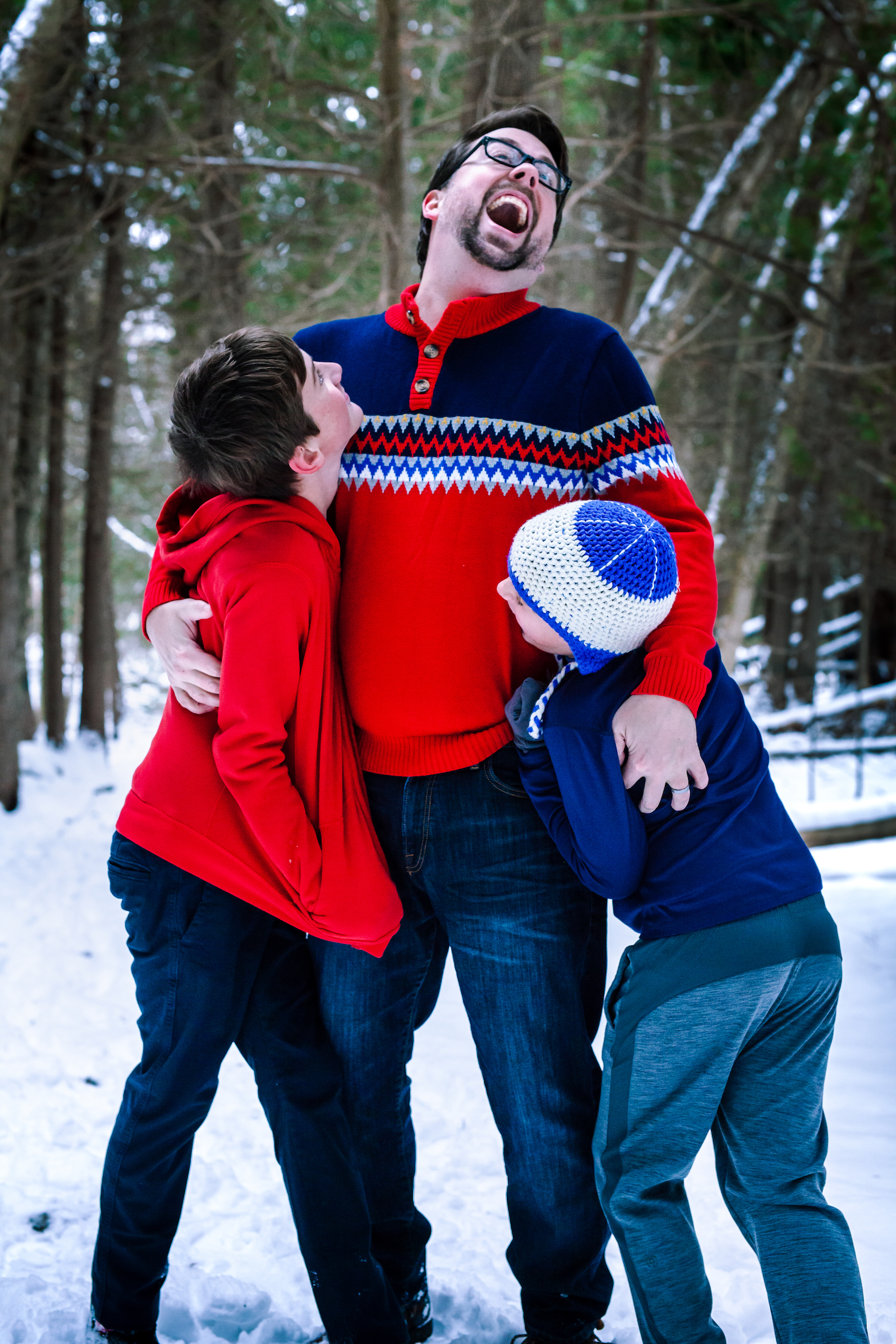 Father laughing with children