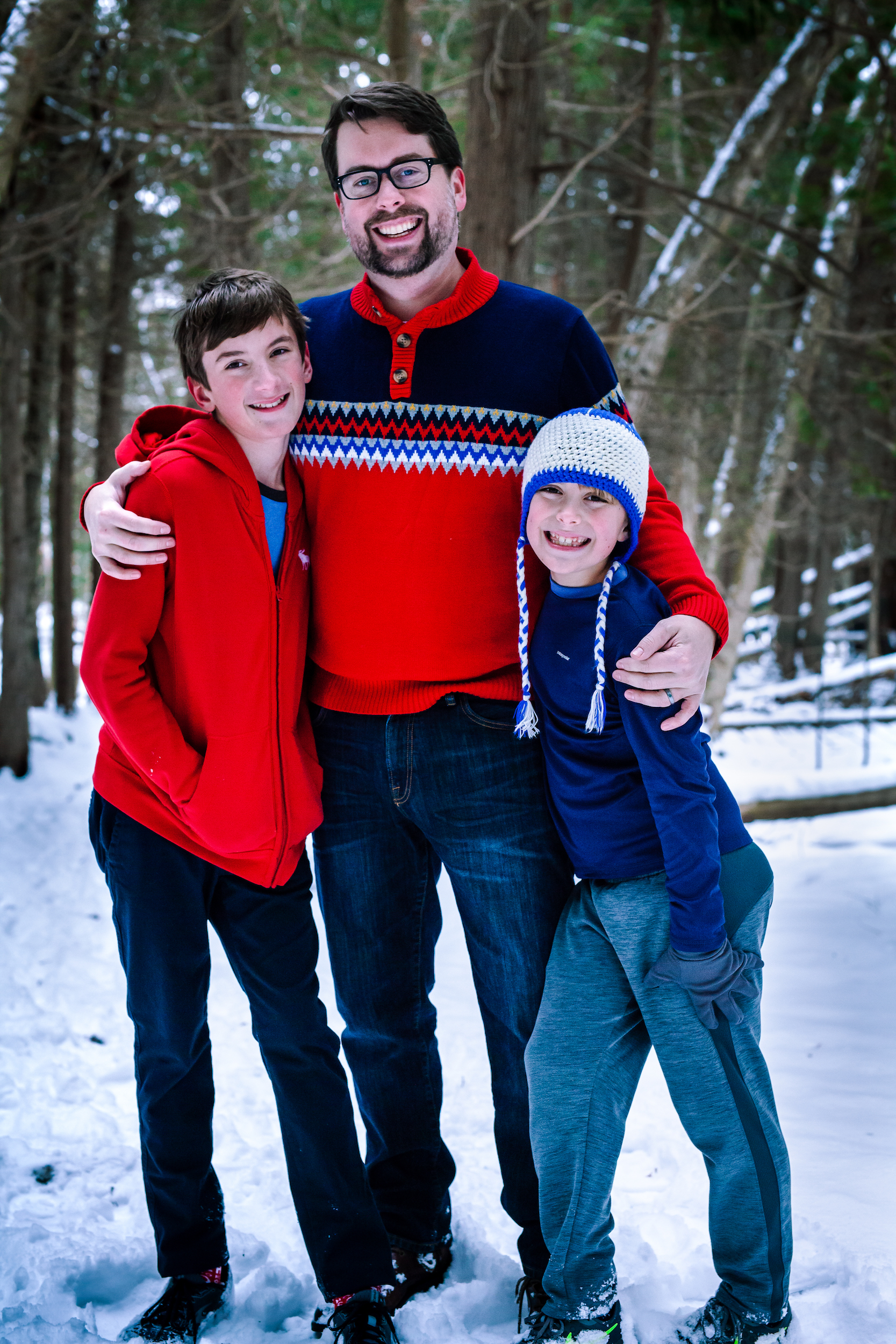 Father and children smiling